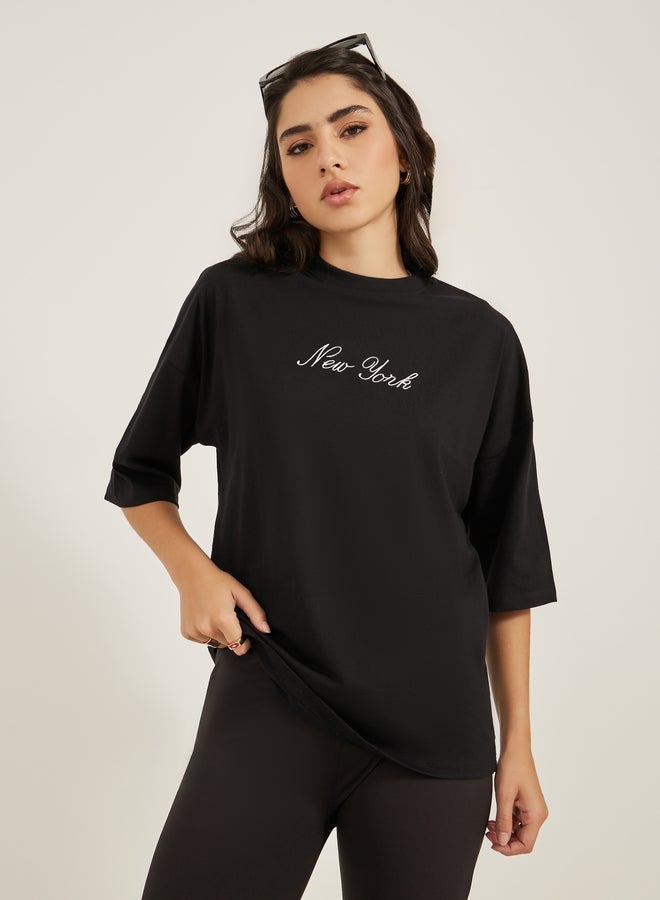 Styli Embroidered Slogan Round Neck Oversized T-Shirt - Image 1
